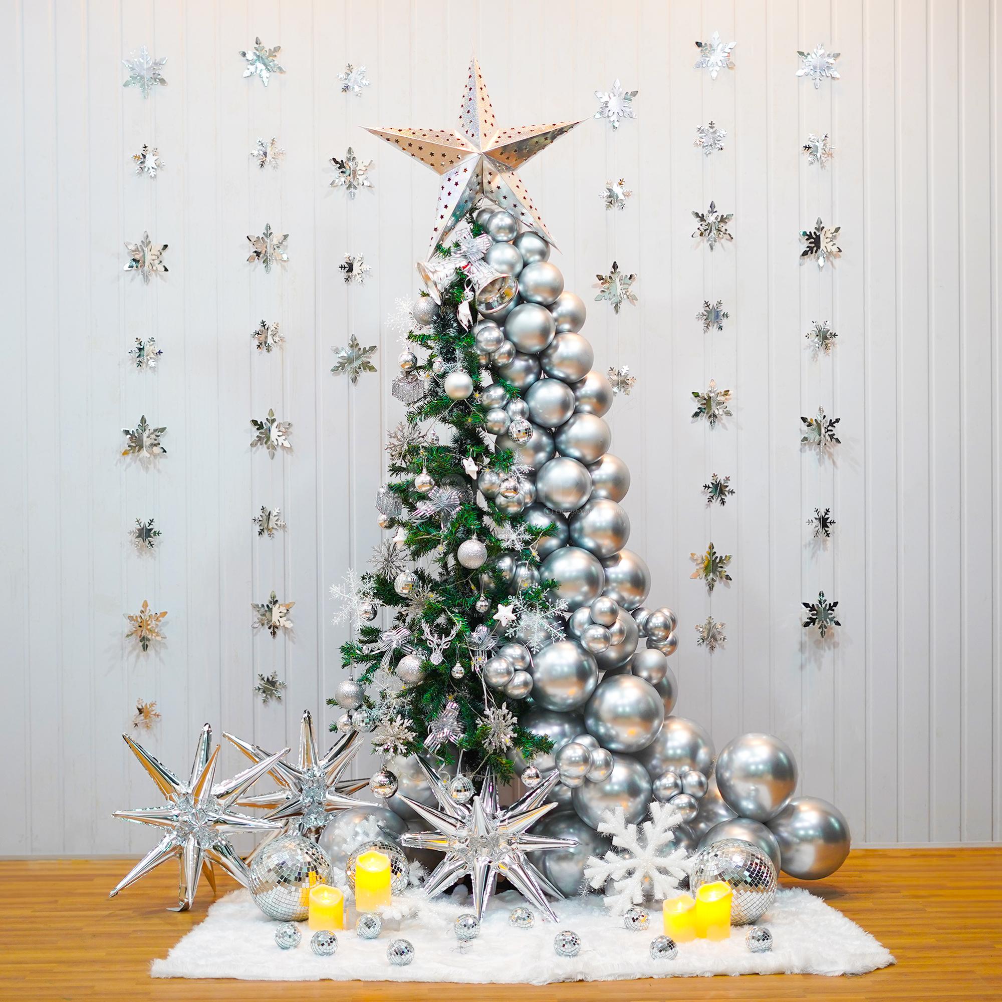 Ring in joy with our Christmas Tree decorations adorned with silver